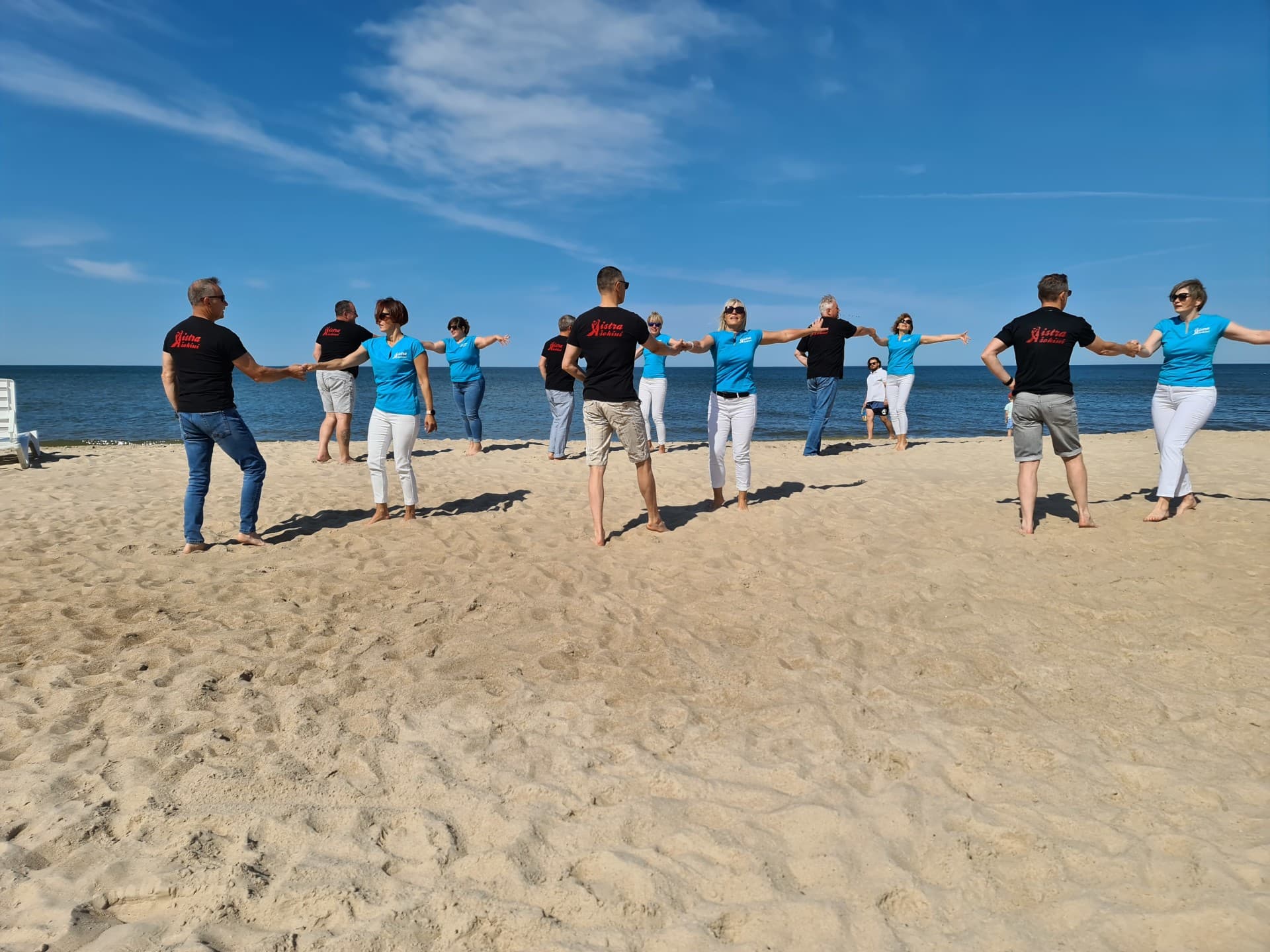 Line dancers in the beach